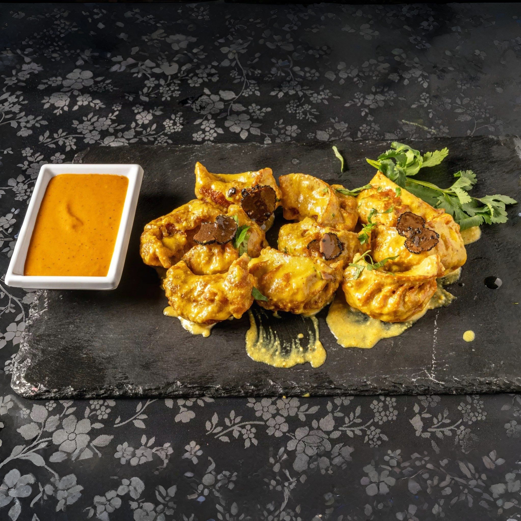 Truffle Korma Chicken Momo.